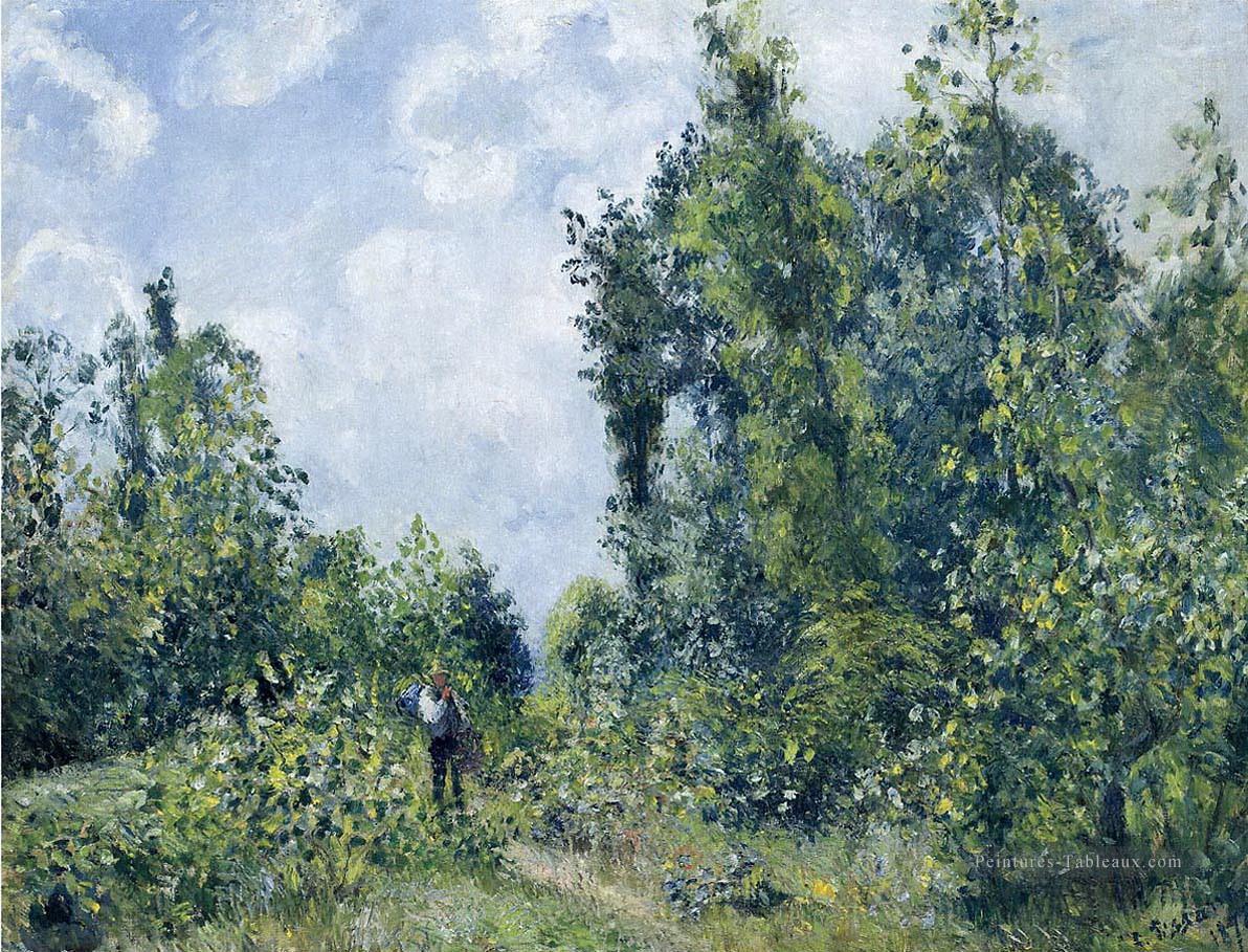 errant près du bois 1887 Camille Pissarro Forêt Peintures à l'huile